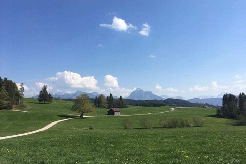 Beautiful tastefully furnished apartment with mountain view The apartment is calm and only 300 m from the Forggensee Badeplatz Forggensee. At the Forggensee you have the opportunity to play Mini Golf and the Kini canoeing always takes beautiful sunse...