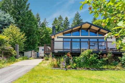 Welcome to your dream home nestled in nature. Backing onto Morrell Nature Sanctuary and walking distance to Colliery Dam Park, this 18,000 sq ft property is one of a kind. This 3 bedroom home offers chalet style living yet close to all city amenities...