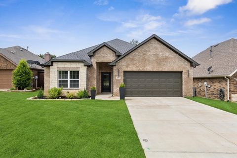 Welcome to your dream home in Terrell, Texas! This brand-new 55+ community offers serene living just 45 minutes from Downtown Dallas. Nestled in a gated community, this property ensures privacy and peace of mind. Discover a bright, modern open floor ...