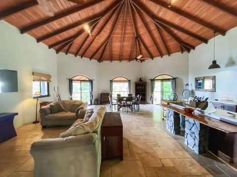 Perched on the hill above Cane Garden Bay with views to Jost Van Dyke, St Thomas and some spectacular sunsets is a rather unique house. Priced to sell! At approx. 6500 sqft the replacement cost of this home would far exceed the list price! Designed a...