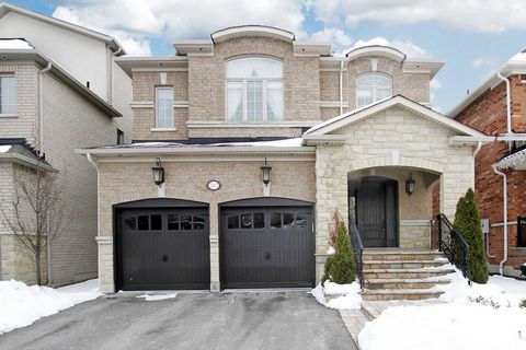 Stunning 3 Story 5 Bedroom Home +Loft (With 4 Pc Bath & Wetbar).Fully Upgraded Top To Bottom With No Expense Spared On Custom Finishes. Custom Kitchen Cabinets With Granite Countertops And Backsplash. 9' Ceiling Main Floor, Hardwood & Marble Througho...