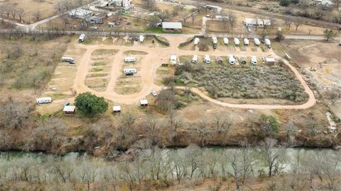 Cabo San Saba RV Park: Located in an Opportunity Zone. Overlooking the San Saba River. 48 units: 39 RV lots with 12 RV-POH, 4 cabins, 2 bunkhouses, and 3 storage units. City water and sewer systems with WIFI on property. Site pads have individual hoo...