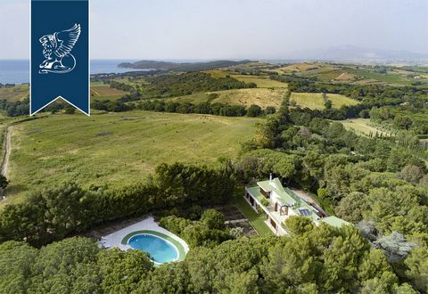 This stunning luxury villa with a view of the sea for sale is in Baratti, on the Tuscan coast in the province of Livorno. The estate measures 700 sqm and is surrounded by four hectares of grounds featuring a forest, a vineyard and a charming rose gar...