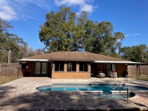 Home Sweet Home! Pool home with fully fenced backyard on approximately half acre lot with a 3/2 split floor plan with a side entry full 2 car garage. All tile flooring ready for new owners to make this beautiful house a Home. The heated pool is 26x16...