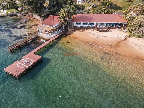 Film mansion standing on the sand in Angra dos Reis-RJ Private beach of few houses, with crystal clear water. Beautiful new gourmet area with hydro and a spectacular sea view. Land: 21,657 square meters. Built area: 387m2. House with eight bedrooms, ...