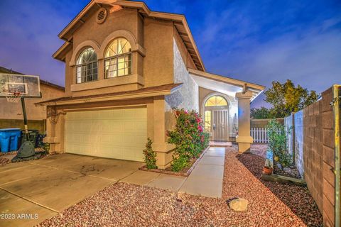This stunning home boasts an exceptional backyard oasis that features a sparkling pool, making it an ideal spot for enjoying the beautiful Arizona weather and entertaining guests. The property also offers a large lot, providing ample space for outdoo...