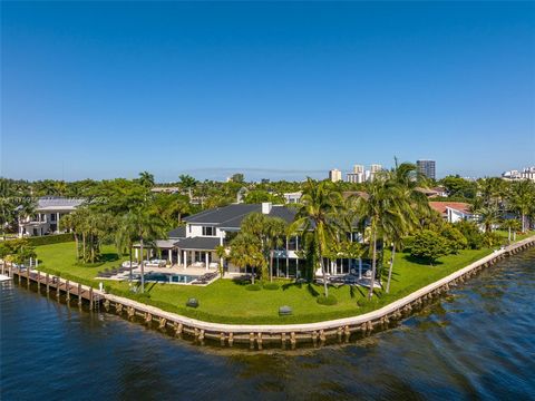Tucked away within the prestigious, guard-gated community of Golden Isles stands a legacy estate that redefines luxury living. Situated on a secluded cul-de-sac, it promises an unparalleled experience of a lifetime. Dominating a point lot, the proper...