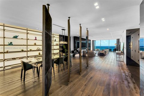In the exclusive Bal Harbour enclave, an exceptional direct oceanfront residence by YODEZEEN Architectural Firm. This 3,345 sq. ft. turnkey residence offers stunning ocean and bay views, marble/wood flrs, private elevator, 10-ft ceilings & custom clo...