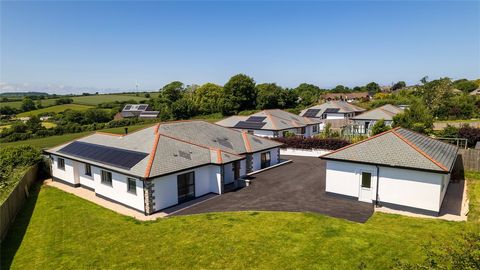 Situated on the edge of the popular village of Buckland Brewer is this incredible detached eco-friendly bungalow which enjoys stunning countryside views across open fields. Currently owned by the developer himself on this bespoke development of only ...