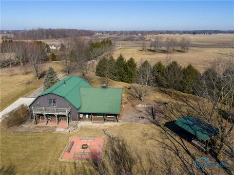 Come and experience this 73+/- acre property, featuring 58 acres of rolling woodlands and picturesque pasture. While here, you'll want to explore the expansive trail network that winds through the landscape. Main building on the property features 148...