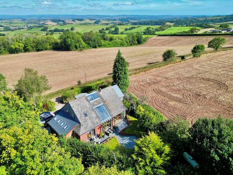 Tucked away in picturesque countryside close to Haldon Forest, sits this captivating and serene haven. It has been beautifully designed to maximise natural light and to make the most of the stunning elevated views of the surrounding rural landscape. ...