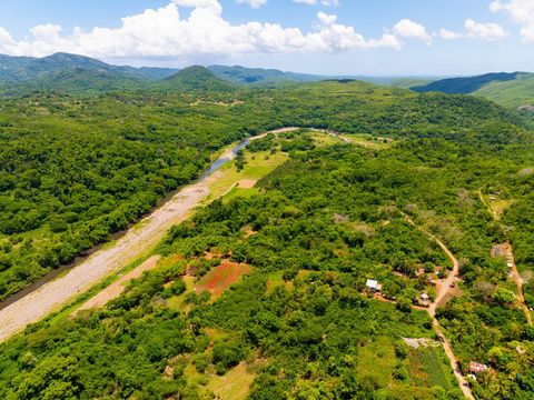 The Rio Minho runs through it! Discover a unique investment opportunity with this expansive 14-parcel property, totalling 154 acres. This prime land is being sold as a single entity and comes with an active quarry, complete with a valid quarry licenc...
