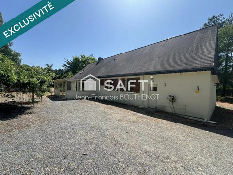 Maison de plain-pied avec dépendances, étang, potager et terrain arboré de 5317 m²