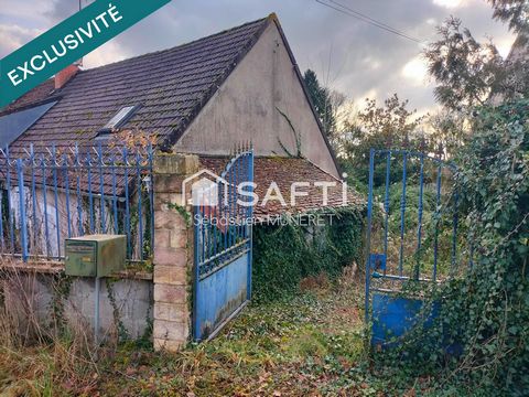 Maison mitoyenne dans un village au calme à restaurer .