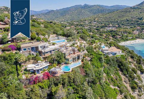 Lying on a cliff that descends towards the crystalline sea of Sardinia, in the town of Maracalagonis in the Province of Cagliari, this prestigious luxury villa is for sale. The property is divided into six apartments on four terraced levels, each wit...