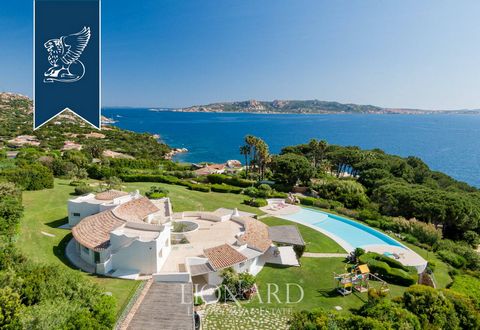 This gem of modern architecture is for sale in Palau, in Sardinia, offering wonderful views of the sea. Characterized by a scenic amphitheater shape that takes inspiration from its rocky surroundings, this luxurious property is immersed in a 5,000-sq...