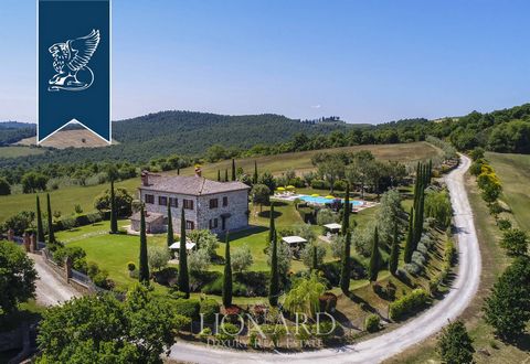 On a high and elevated position on the peak of a hill, there is this staggering typically-Tuscan farmhouse for sale. This estate overlooks one of the most breathtaking parts of the Chiana Valley and offers a mesmerising view over the historical hamle...