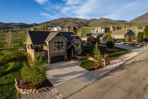 Located in the heart of Ogden Valley in the highly sought-after Preserve community. This home is just a short walk, bike, or car ride, to endless outdoor recreation! Just steps from your front door are wonderful walking trails, and the fantastic Side...