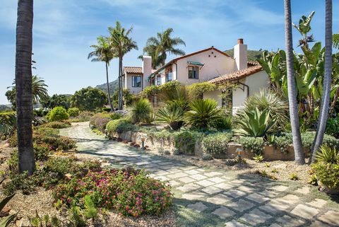 Nestled between the Carpinteria Foothills and the Pacific Ocean, this romantically classic 1938 Spanish Compound sits on 5-acres in a truly magical microclimate canyon that exudes classic California charm. The two-story residence is detailed with dec...