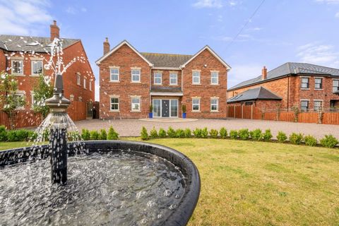 A luxurious executive family home offering a spacious and stylish interior. With approximately 3,350 sq. ft. of living space, this stunning property is located in the tranquil setting of Burgh Le Marsh. Boasting an electric gated entrance and ample p...