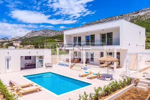 Property Description: This modern gem is located in the hinterland to one of the most popular tourist destinations in Dalmatia - Omiš. Surrounded by untouched nature in the hills above Omiš, just 8 km from the sea and the picturesque old town, you ar...
