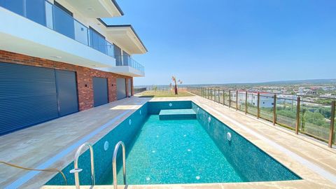 Luxury 4 bed detached villa located in Didim Akbuk side. only 5 minutes driving to beaches and supermarkets. The house has been built on 700sqm a plot of land. and has 4 beds 4 baths an living room with kitchen and has outdoor swimming pool and indoo...