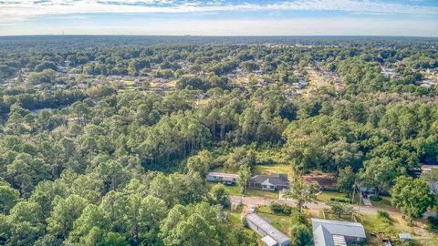 Finally, a large property in town! This 3.65 acre lot is ready to build on. It is close to everything, but still has a back country feel. This property has about 1.5-2 acres of beautiful wetlands (including a creek believed to be the beginning of Sug...