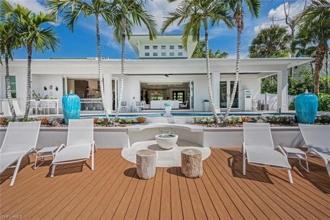 Completely refashioned in 2023 with a sophisticated eye, a chic waterfront oasis, where you can launch paddle boards, kayaks, or jet skis right from your backyard, through Clam Pass to the Gulf of Mexico. Designer-curated finishes harmoniously blend ...