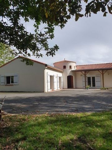 Summary CABINET CHEVALIER offers you in the countryside, a contemporary house built in 1988 and offering on the ground floor, an entrance leading to a living room with cathedral ceiling of 41 square meters and access to the terrace, a kitchen of more...