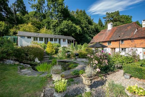 Welcome to Highland Cottage, nestled in the picturesque Surrey Hills, where time seems to stand still. In this charming countryside retreat, we invite you to discover a truly exceptional home—an exquisite Grade II Listed 12th-century dwelling steeped...
