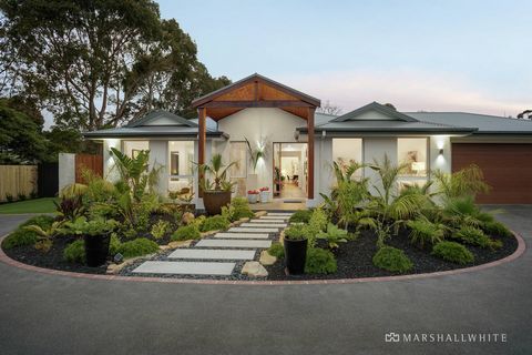 “Mandevilla” Inspired by the signature elements of luxurious Noosa resort style architecture and design, this stunning, recently completed four bedroom family home, known as Mandevilla, is set within lush tropical-themed landscaped gardens and featur...