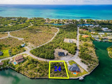 This exceptional single-family canal lot spans an impressive 18,700 square feet, boasting a generous 130 feet of canal frontage. Perfectly situated in Fortune Bay, within walking distance to the beach, this parcel offers unparalleled convenience for ...