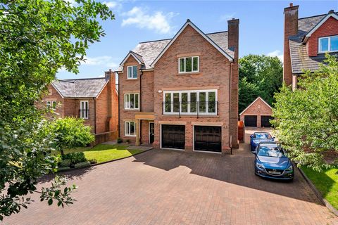 Welcome to this exquisite six-bedroom detached house located at the edge of Great Harwood that is offered with no chain delay. This luxurious property, owned since new by the current owners, is a true gem within a private gated development of just fi...