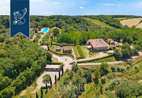 Set on the serene Tuscan hills between Florence and Pisa, this 13th-century farmhouse offers a blend of historical charm and modern luxury. The estate, spanning over 16 hectares, includes a main villa and two annexes, totaling approximately 700 sqm o...