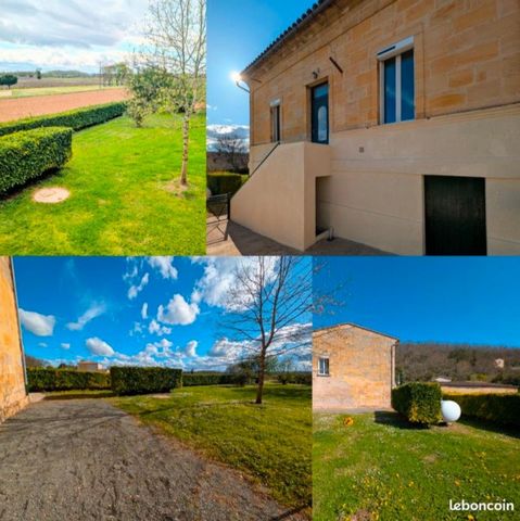 Maison en pierre avec jardin