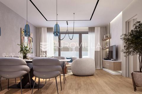 Second floor, three-bedroom apartment with a total area of 92.15 m2. It consists of an entrance hall (10.30 m2), an open-concept kitchen, dining room and living room (28.47 m2) with access to a 17.62 m2 balcony with a beautiful sea view, two bedrooms...