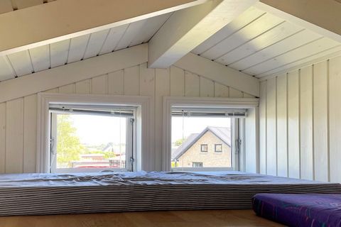 Holiday cottage with a unique location on a secluded natural plot a few metres from the coast with unique views of Vemmingbund Bay that has one of the best and most child-friendly beaches in Denmark. The house has a combination of modern and cosy fur...