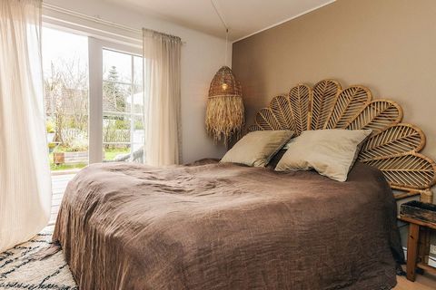 This charming holiday home offers a cozy retreat with two comfortable bedrooms, each furnished with double beds, and an additional loft with two extra beds. Ideal for families or small groups, the property features a welcoming living area with modern...