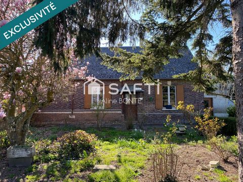 Maison en briques avec une dépendance