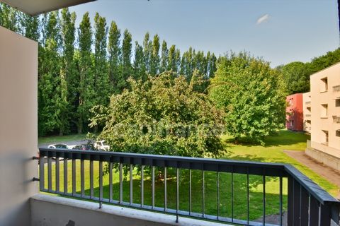 Studio fonctionnel avec vue sur parc, balcon, cave, et stationnement