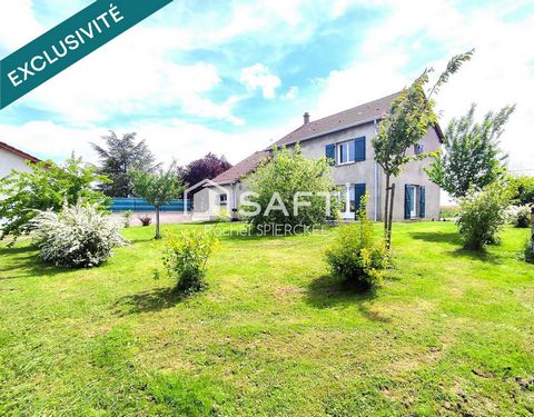 Maison individuelle avec garage et jardin