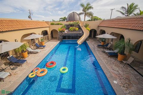 **Excellent Opportunity to Own a 14,000 Sq. Ft. Lot** **Stunning Beachfront Estate + 2 Additional Oceanfront Parcels** Let your imagination run wild! A vacation retreat, boutique hotel, luxury Bed & Breakfast, condominium development, or your OWN pri...