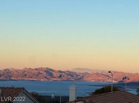 Perched above Lake Mead in the coveted Key Largo subdivision lies a single-level home tucked away on a cul-de-sac that delivers gorgeous views of Lake Mead! This low-maintenance home interior/exterior has been freshly painted, AC and water heater hav...