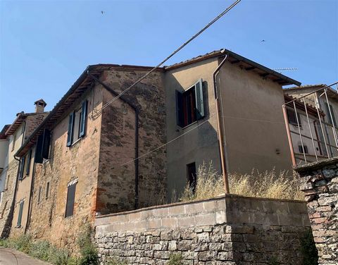 PANICALE (PG), Loc. Macereto Basso: in a panoramic semi-hilly position, within the small hamlet, detached stone house of approx. 120 sqm on two levels, comprising: * Ground floor: various funds and garage; * First floor: with access via external stai...