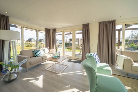 This luxurious, detached villa is located in the brand-new (2021) Resort on the Maas, on a side branch of the river with the same name, near Kerkdriel. The villa covers two floors and is modern and comfortably furnished and fully equipped. On the gro...