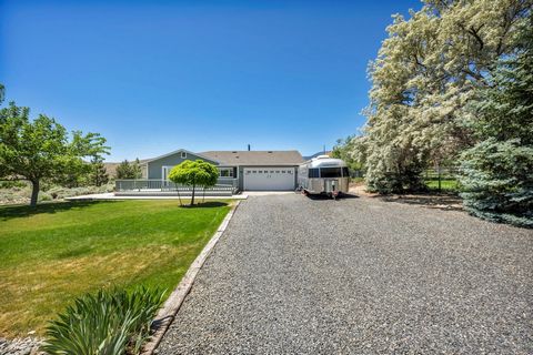 Stunning Views and Space! Don't miss this Pleasant valley home! This home features 4 bedrooms 3 bathrooms and 2458 sqft of living. The home sits on 1.02 acres with plenty of space to build a shop/barn or do additional landscaping. This home sits on t...