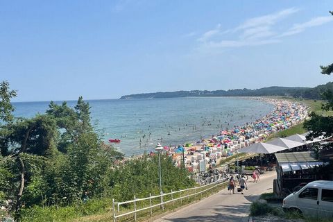 Jasny apartament wakacyjny z balkonem, sauną i kominkiem, zaledwie 400 m od południowej plaży!