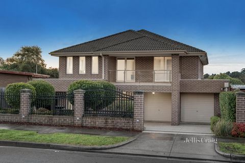 Showcasing immediate appeal and generous space, this contemporary home in a prized location delivers a rewarding family lifestyle and a promising future. Gleaming porcelain tiles flow from the entry hall to a home office/5th bedroom, complemented by ...