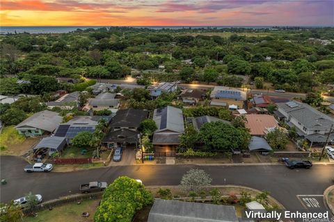 Final Price Drop! This property appraised at this price over a quarter ago! Now you can have a very affordable mortgage. Live in one unit and rent the other! Here is your opportunity to get this amazing home located on the North Shore of Oahu in Waia...