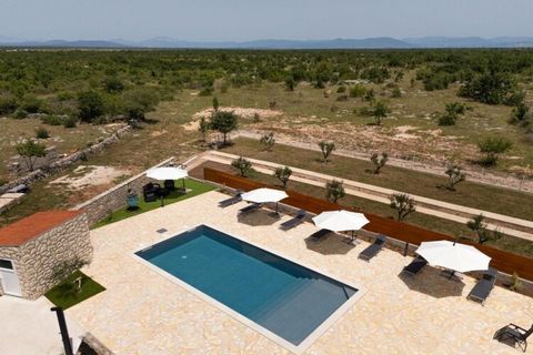 Villa Roški Slap in Bogatić, Šibenik-Knin County, is located near the famous Roški Slap, a beautiful waterfall in Krka National Park. This villa offers a peaceful, nature-rich setting ideal for those looking to explore the surrounding natural attract...
